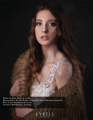 Porträt eines jungen Models in eleganter Kleidung mit einem plüschigen Mantel.